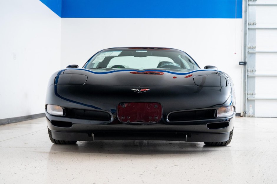 Chevrolet Corvette cu 27 de kilometri la bord
