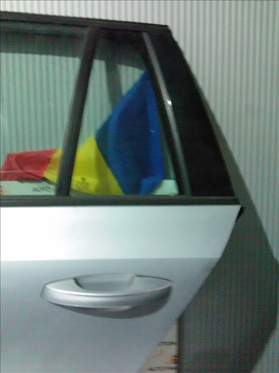 Coltar geam usa stanga spate SKODA OCTAVIA 3 an fabr. 2015