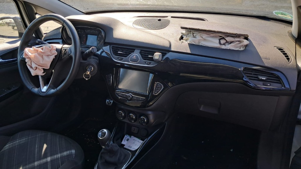 Consola centrala Opel Corsa E 1.4 Turbo 74KW/101Cp cod motor B14NEJ transmisie manuala 6+1 an 2017