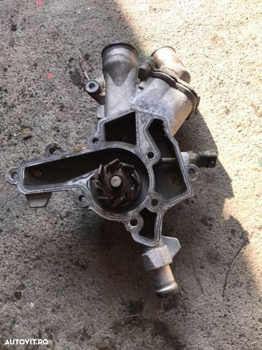 Corp termostat + pompa apa Opel Corsa D 1.2 benzina.