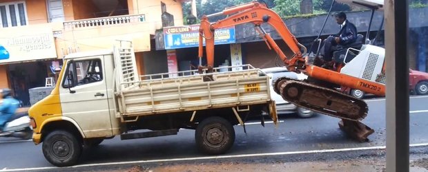 Cum sa incarci singur un excavator intr-un camion