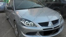 DAYLINE FARURI CU ANGEL EYE MITSUBISHI LANCER 2003...