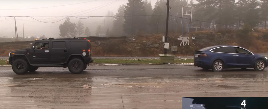 De data asta si-a gasit nasul. Dupa ce a invins un Land Cruiser, Tesla intalneste un Hummer H2