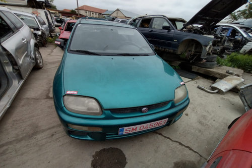 Dezmembram Mazda 323 BA [1994 - 1998] Hatchback 3-usi 1.5 MT (88 hp)