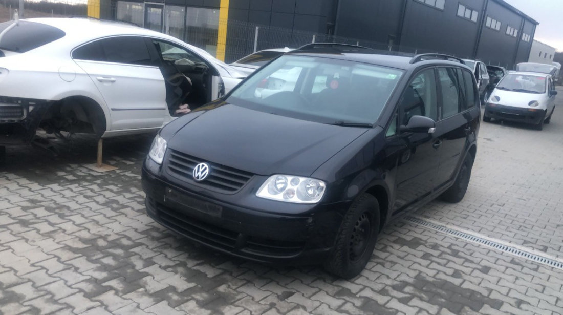 Dezmembram Volkswagen Touran 1.6 benzina an fabr 2006