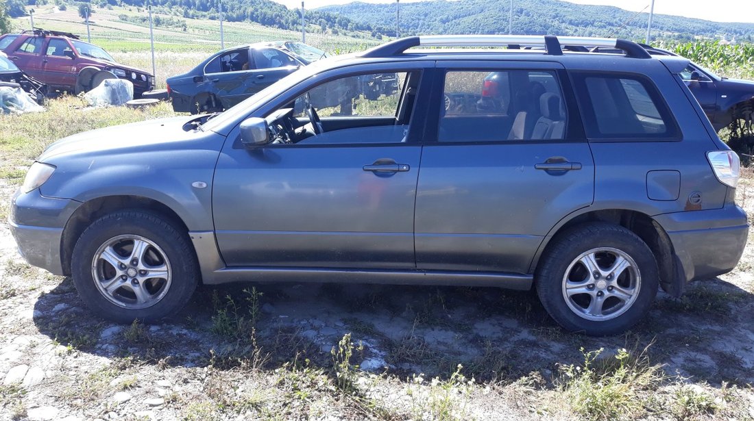 dezmembrari dezmembrez piese Mitsubishi Outlander an 2004 4x4 2400cmc benzina hidramata