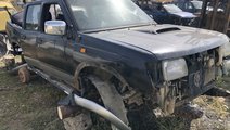 Dezmembrari dezmembrez piese nissan navara an 2000...