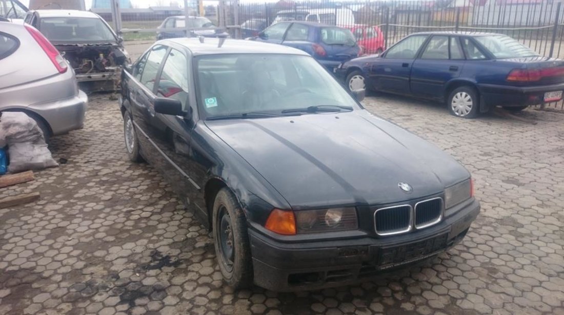 Dezmembrez BMW 318i E36