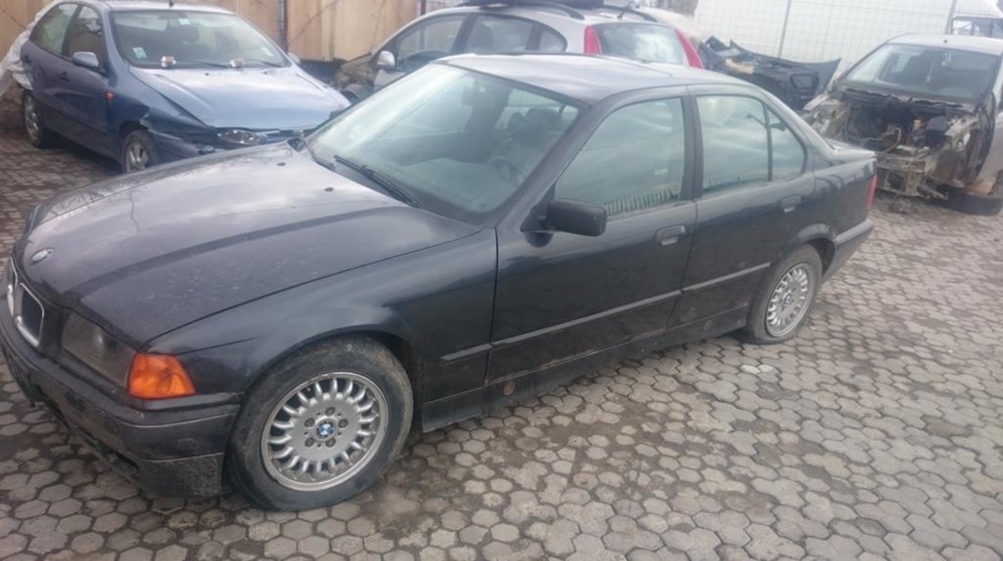 Dezmembrez BMW 318i E36