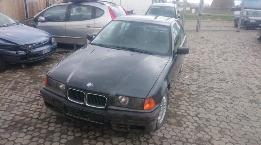 Dezmembrez BMW 318i E36