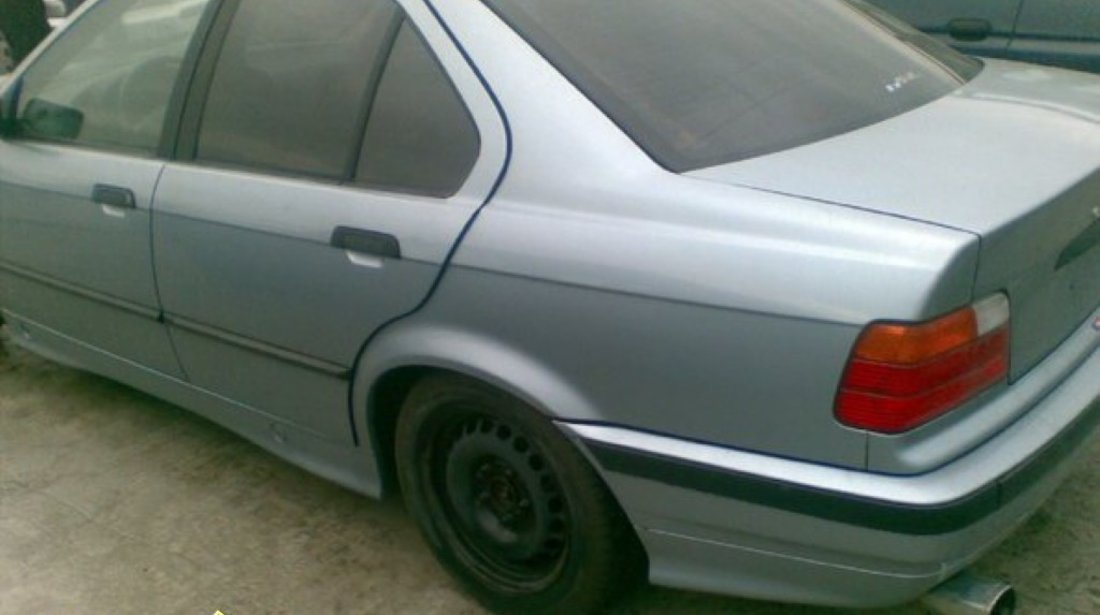 DEZMEMBREZ BMW 320I AN 1995