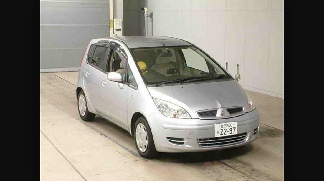 Dezmembrez Mitsubishi Colt an 2005 motor 1.5 diesel