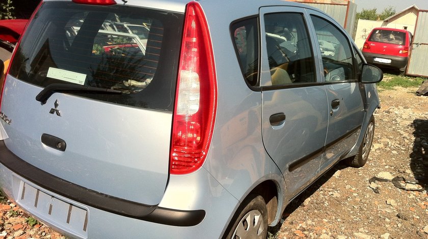DEZMEMBREZ MITSUBISHI COLT IN 5 USI AN 2006 1.1 I 5 TREPTE