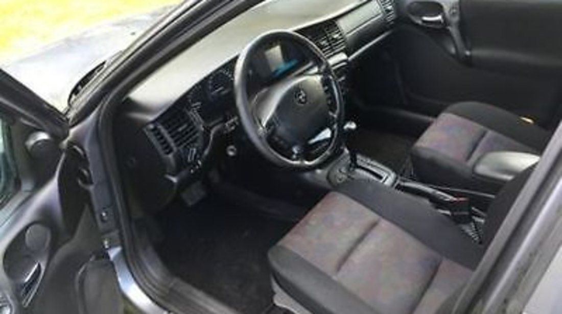 dezmembrez opel vectra b 1.6i an 2002