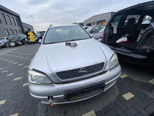 Dezmembrez piese caroserie, motor, cutie viteze, suspensie Opel Astra G Combi (F35) 1.7 DTI 2001, Y1...