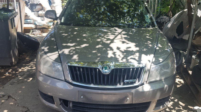 Dezmembrez Skoda Octavia 2 Facelift 1.6 TDI CAY 105 cp 2012 culoare:LF8H