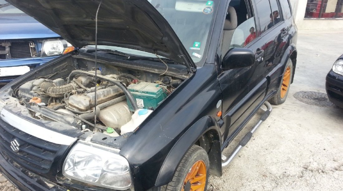 Dezmembrez Suzuki Grand Vitara 2 0 i din 2002