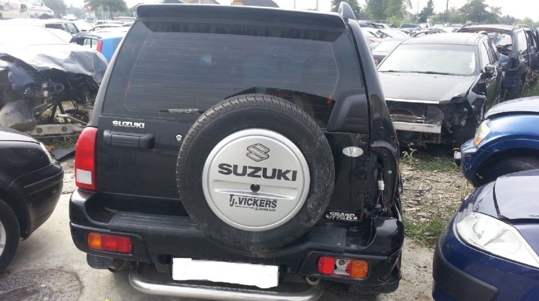 Dezmembrez Suzuki Grand Vitara 2 0 i din 2002