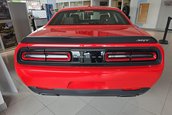 Dodge Challenger SRT Demon cu 16 kilometri la bord