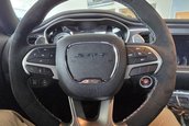 Dodge Challenger SRT Demon cu 16 kilometri la bord