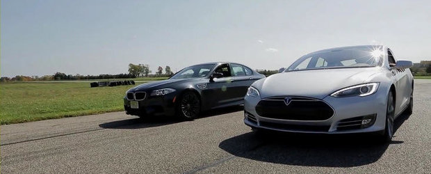Drag Race: Duel electrizant intre noul BMW M5 si recent-lansatul Tesla Model S