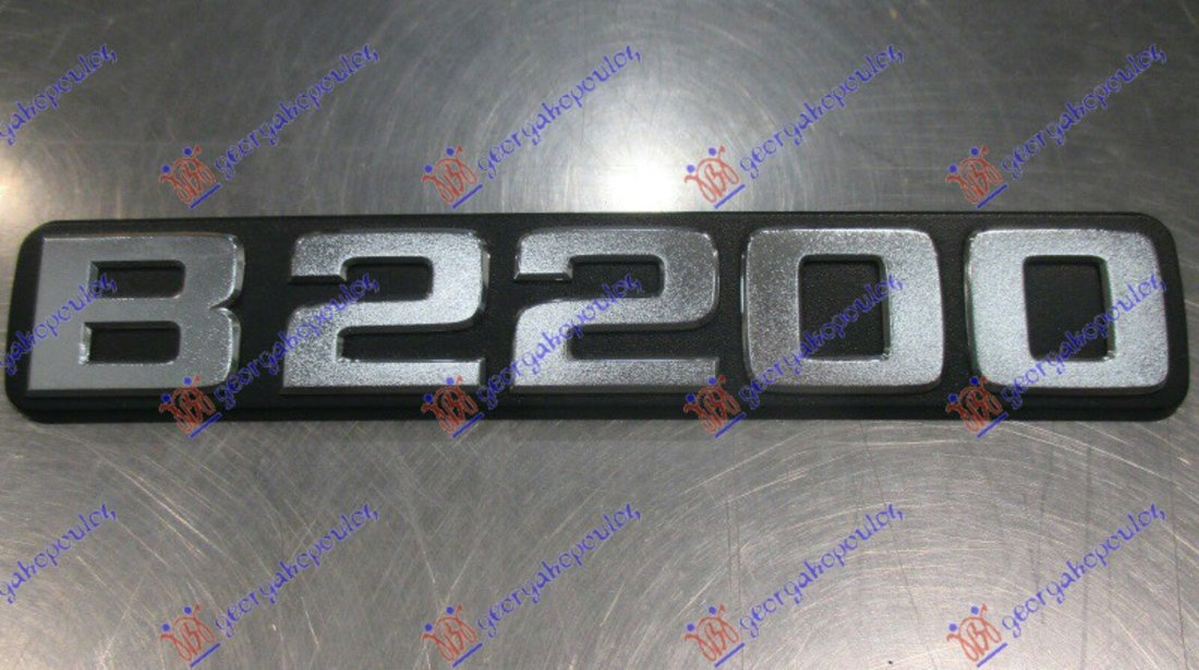 Emblema - Mazda P/U 2/4usi 1986 , Ub73-51-720a