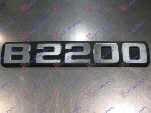 Emblema - Mazda P/U 2/4usi 1986 , Ub73-51-720a