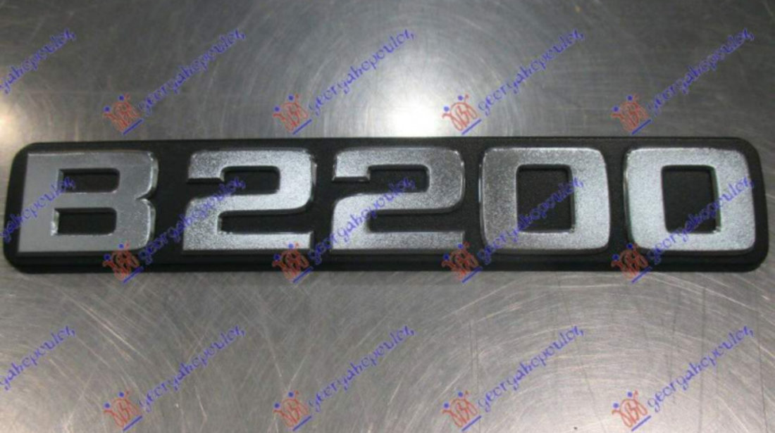 Emblema - Nissan P/U (D21) Double Cab 1986 , 6289186g10