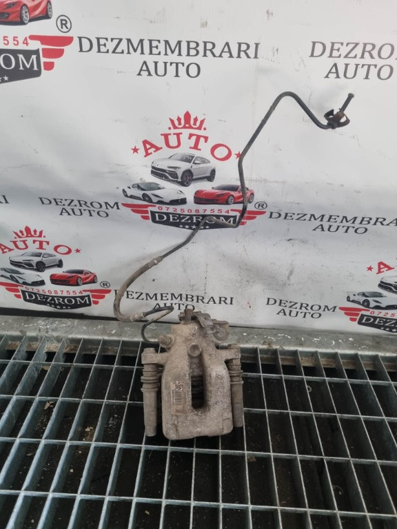 Etrier stanga spate original Citroen C4 1.6 16v cod piesa : 9670365980