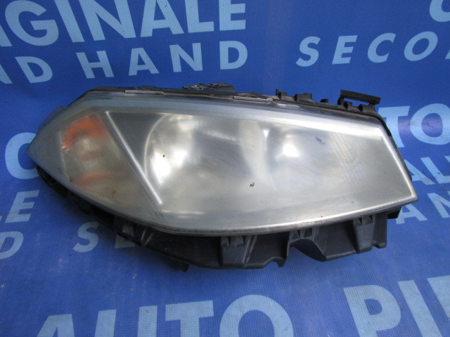 Far Renault Megane ;8200073221J (ureche rupte)