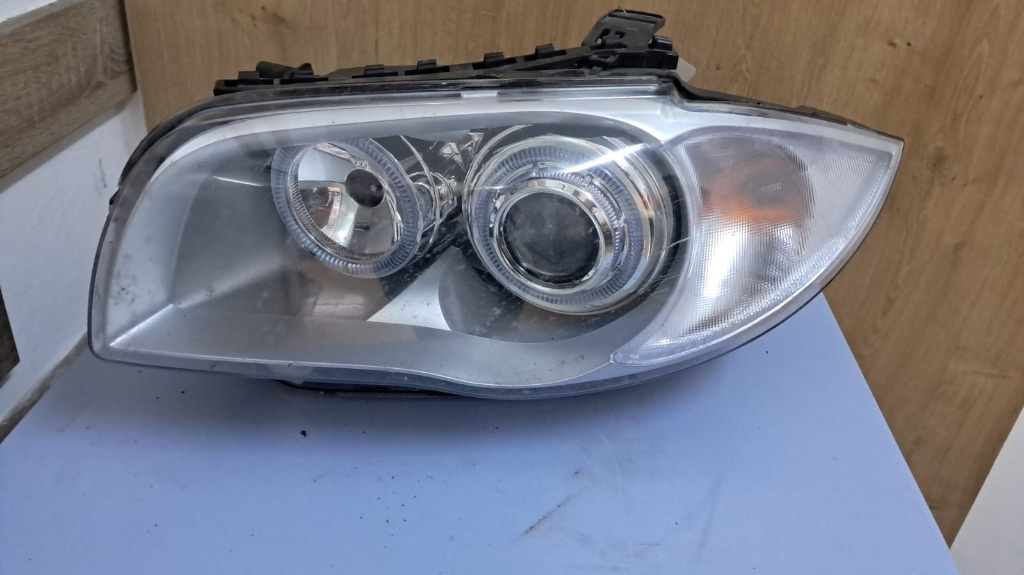 Far stanga cu lupa BMW Seria 1 E87 / E81 / E82 / E88 an 2007 2008 2009 2010