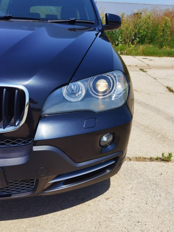 Far stanga fara xenon Bmw X5 E70 an 2008