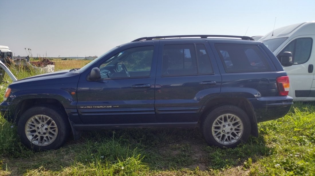 Far stanga Jeep Grand Cherokee 2004 SUV 2.7 CRD