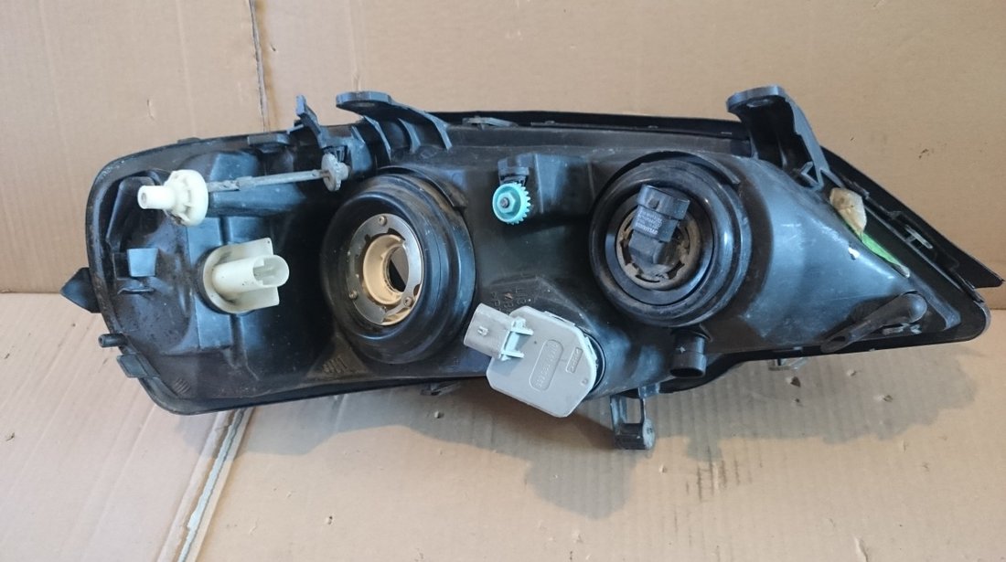 Far stanga Opel Astra G cod 13132459, 1EG00764049