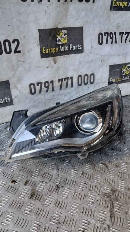 Far stanga Opel Astra J an 2011 cod 1ZT010012-01 / 13253650