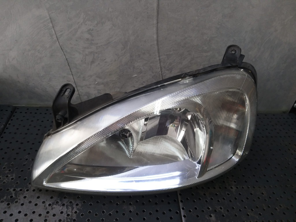 Far stanga opel corsa c x01 09114329 89302111