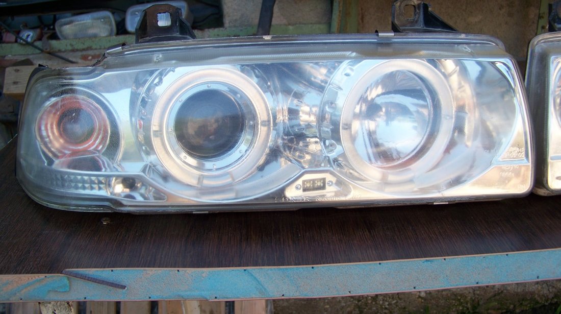 Faruri chrome cu lupa si angel eyes bmw e36 berlina touring compact