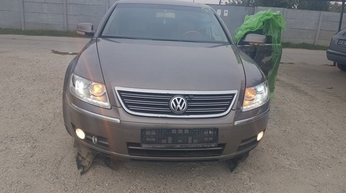 Faruri cu lumini de zi bixenon adaptiv si cornering vw phaeton