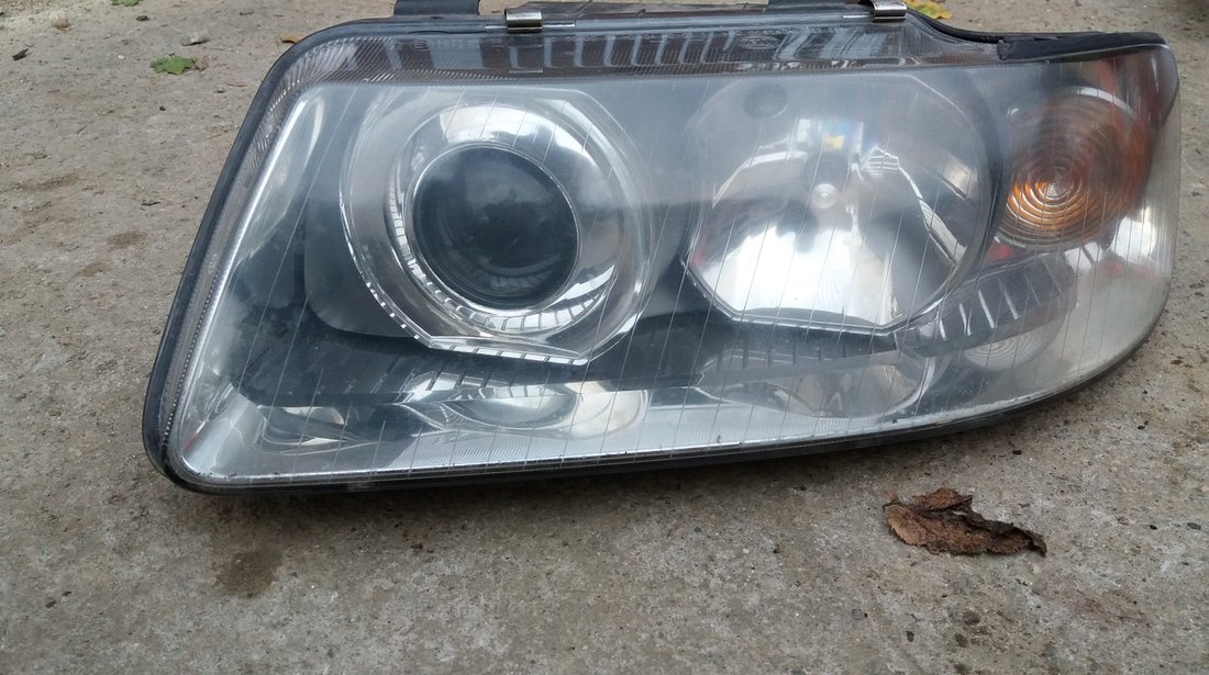 Faruri,Far Audi A3 8L cu Lupa Originale Hella