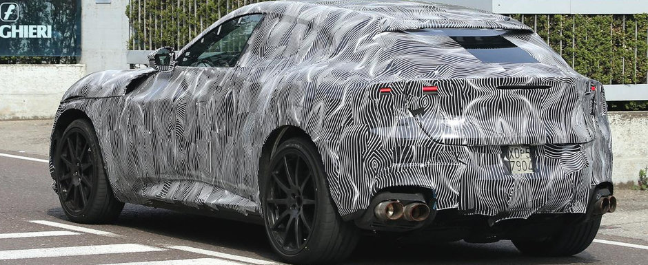 Ferrari nu a glumit cand a spus ca lanseaza un SUV. Noul Purosangue a fost surprins in teste pregatindu-se pentru marele sau debut Ferrari nu a glumit cand a spus ca lanseaza un SUV. Noul Purosangue a fost surprins in teste pregatindu-se pentru marele sau debut