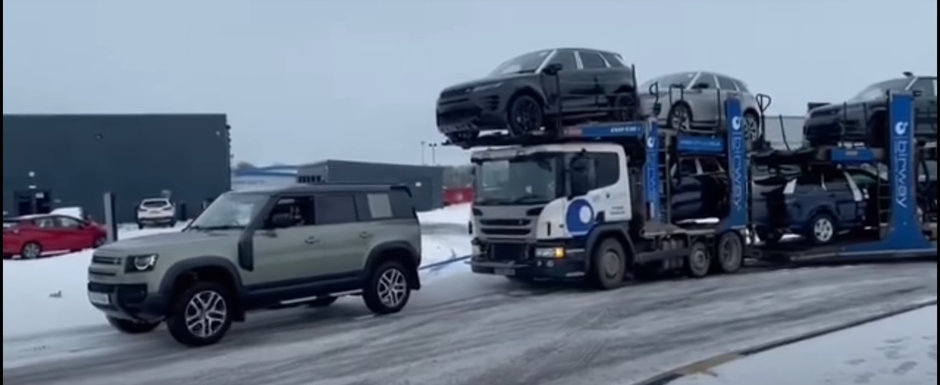 Filmul ASTA e cea mai buna reclama pentru LAND ROVER. Momentul in care noul DEFENDER tracteaza un TIR plin cu masini pe GHEATA