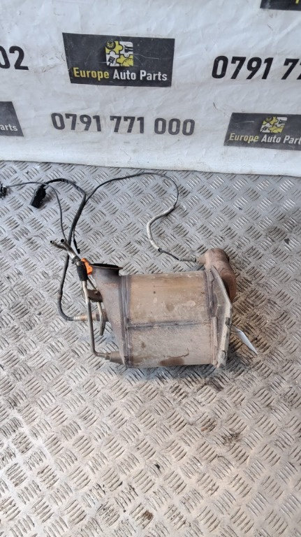 Filtru de particule Vw Touran 1.9 TDI 105CP motor BLS cod JYK an 2008 cod 1K0131723J / 3C0181CA