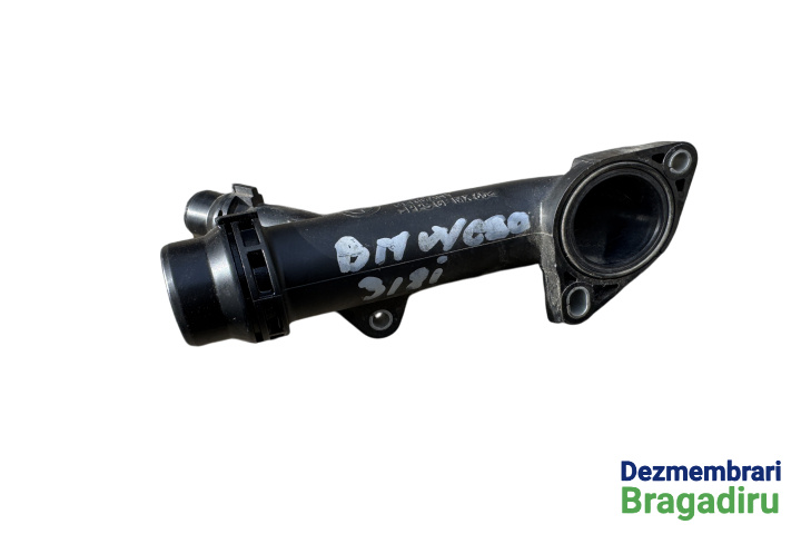 Flansa apa / lichid racire Cod: 7560130-03, 11.53-7560130-03 7560130-03, 11.53-7560130-03 BMW Seria 3 E90 [2004 - 2010] Sedan 318d MT (143 hp)