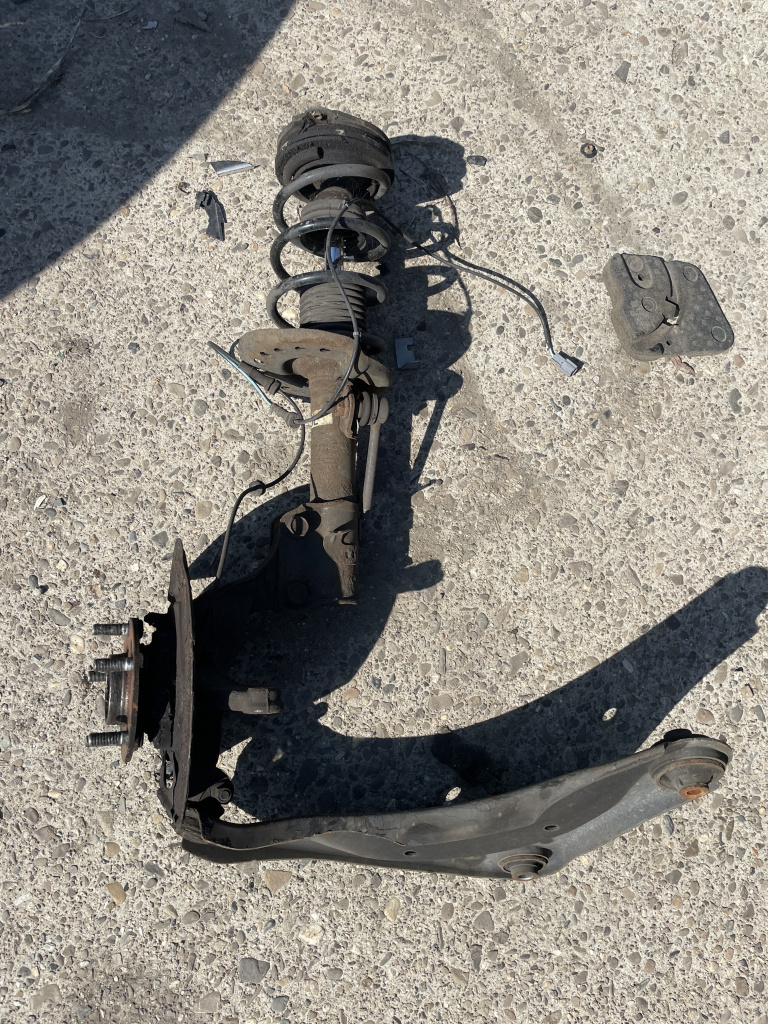 Fuzeta cu amortizor stanga fata Nissan Pulsar 1.2 Benzina 2013, -