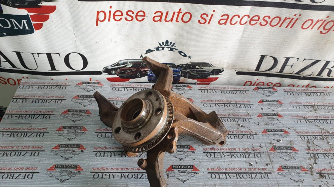 Fuzeta stanga fata originala cu rulment si senzor ABS VW Bora 1.8i 125 cai cod piesa : 1J0407255N