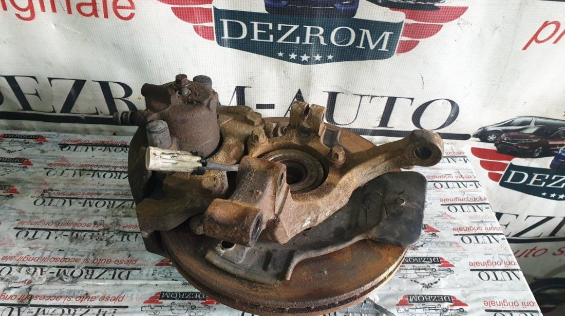 Fuzeta stanga fata originala cu rulment si senzor ABS OPEL Astra G Bertone 2.2 16V 147 cai cod piesa 90498808