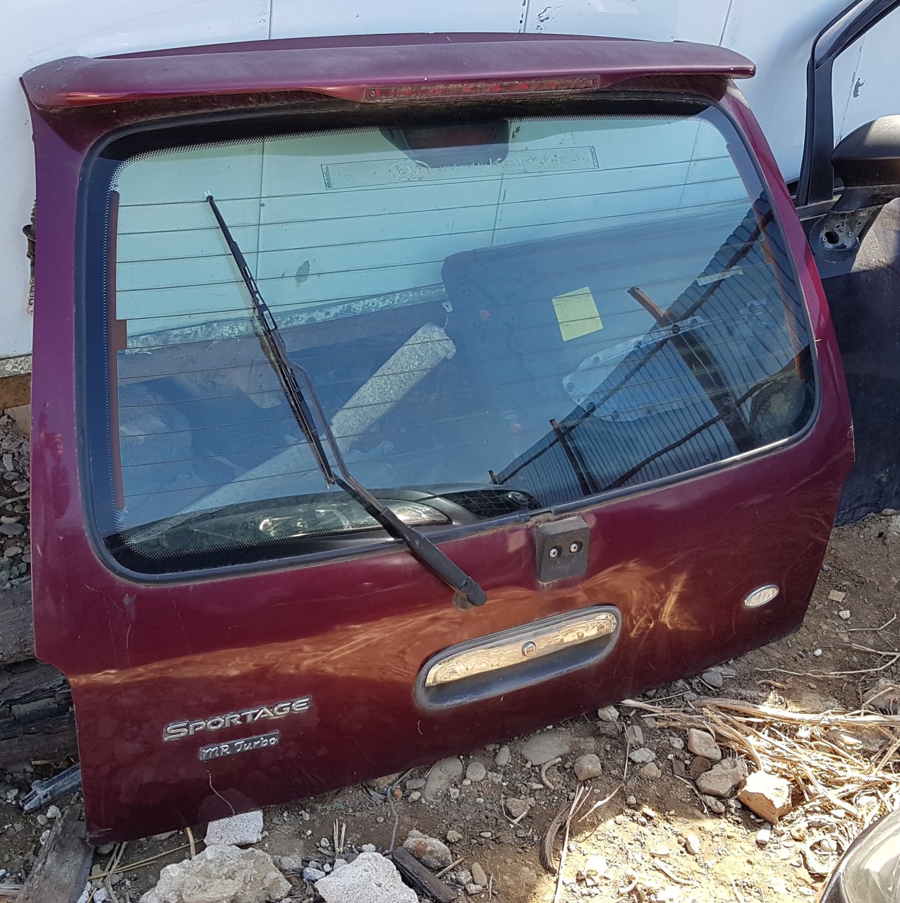 Haion kia sportage anul 1999 visiniu