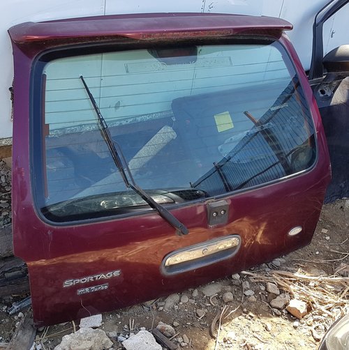 Haion kia sportage anul 1999 visiniu