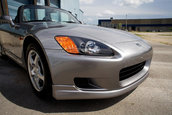 Honda S2000 cu 1.464 km la bord