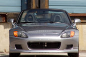 Honda S2000 cu 1.464 km la bord